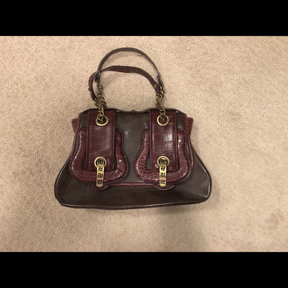 Maroon buckle handbag
